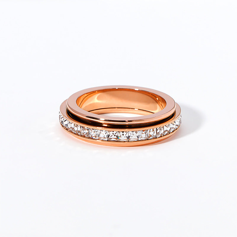 Bague rotative zircon, plaqué or rose 18 carats