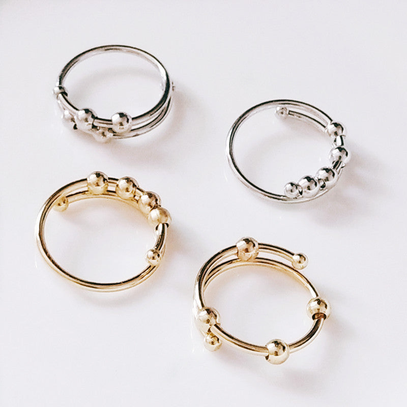 Bague/bracelet anti-stress à perles géométriques