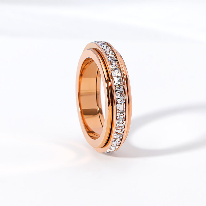 Bague rotative zircon, plaqué or rose 18 carats