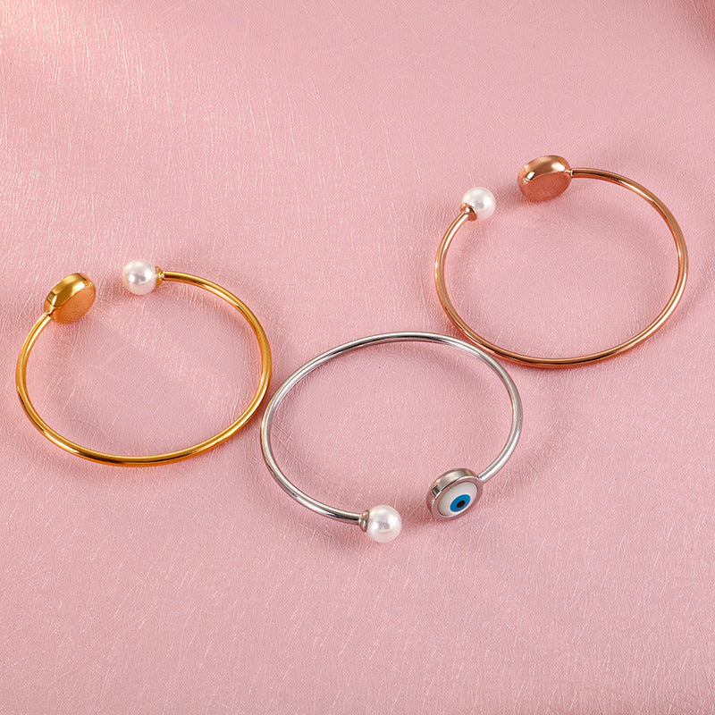 Bracelet ouvert perle et œil protecteur porte-bonheur