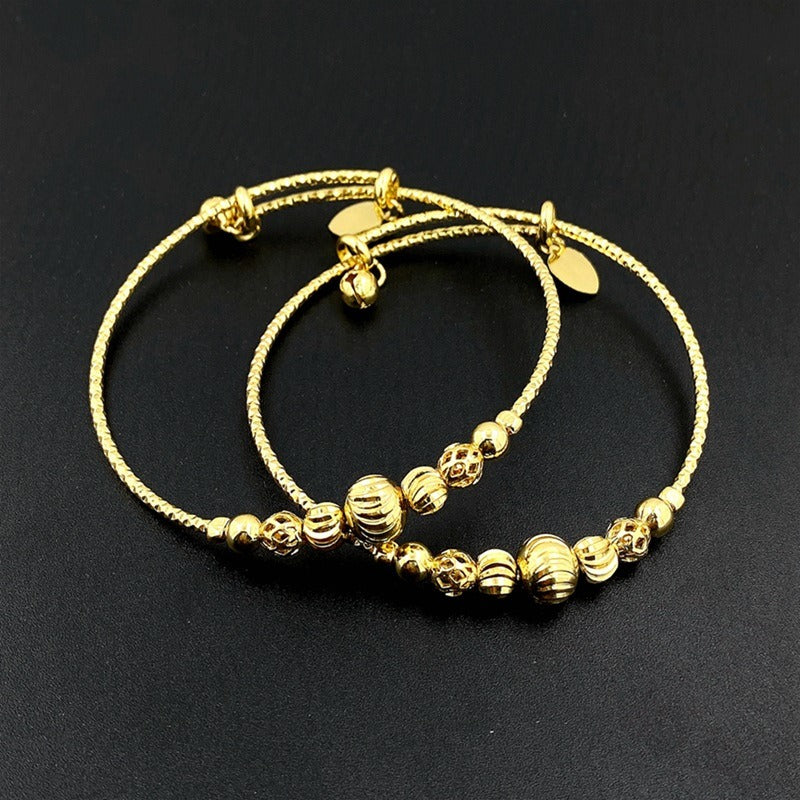 Bracelet clochette perlé ajustable, plaqué or