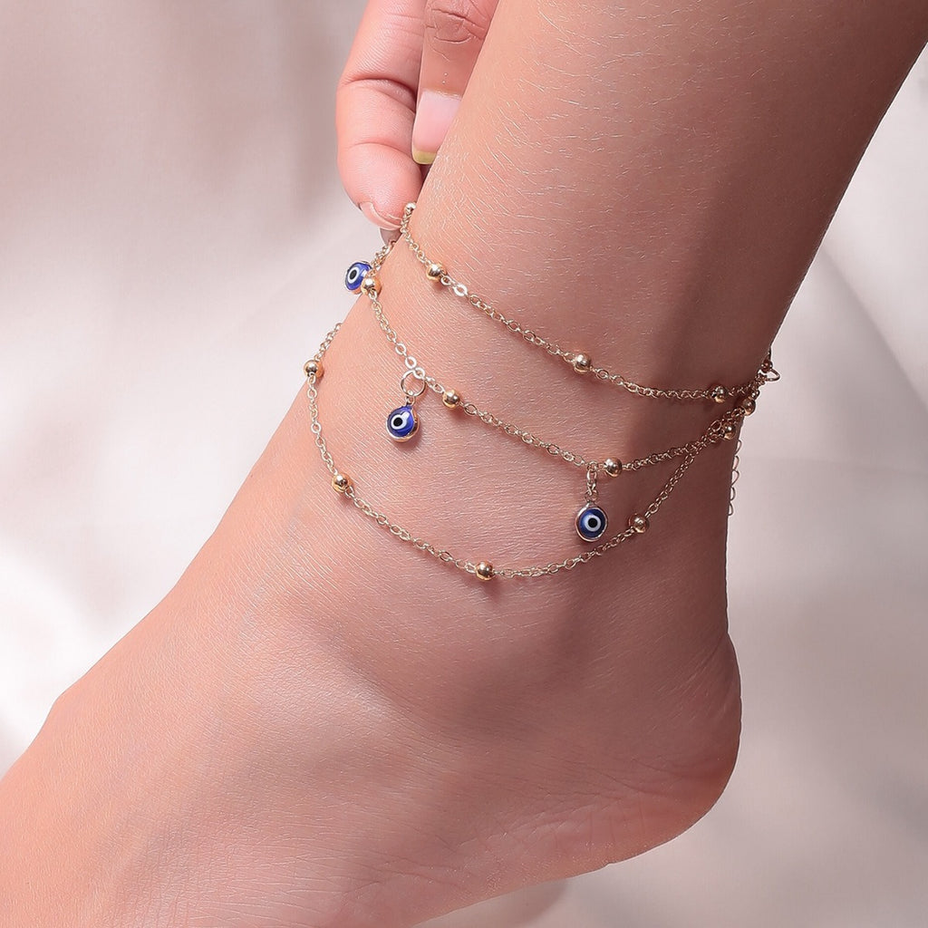 Bracelet de cheville pendentif perle et œil protecteur