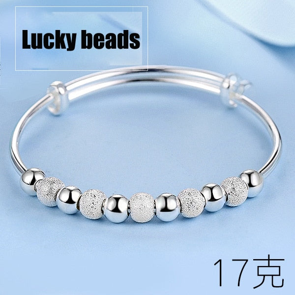 Bracelet jonc porte-bonheur, argenté