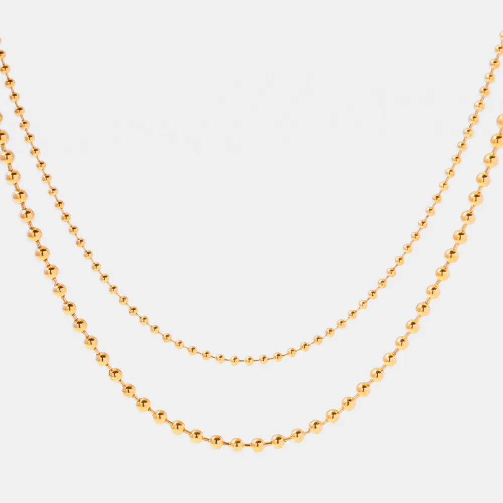 Collier de perles, plaqué or 18 carats
