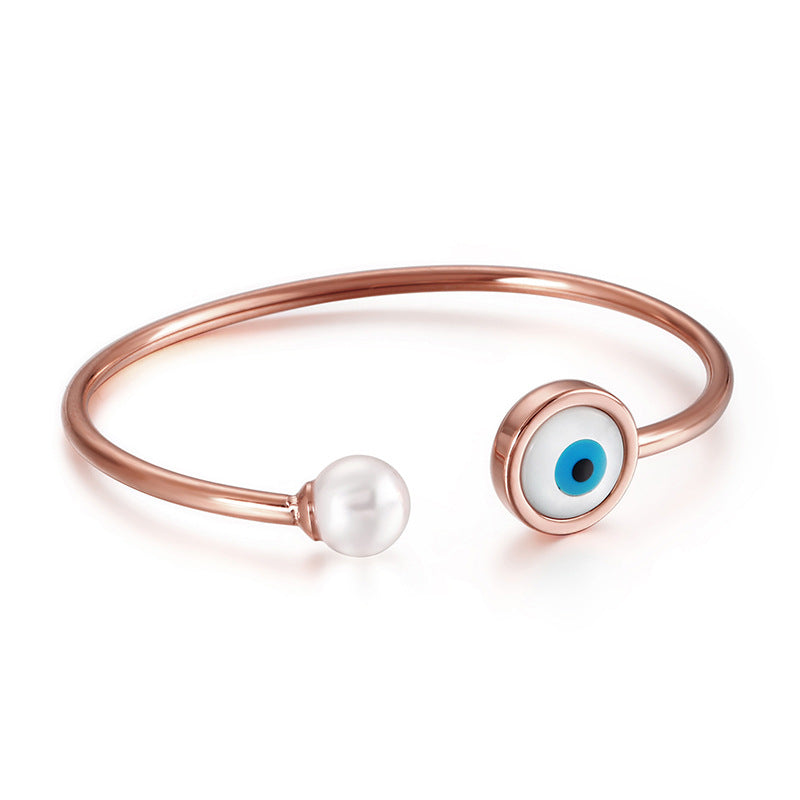 Bracelet ouvert perle et œil protecteur porte-bonheur