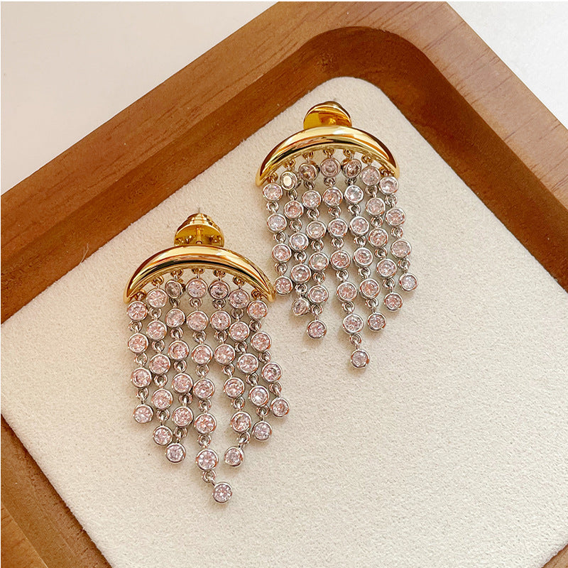 Boucles d'oreilles à pompons, design unique