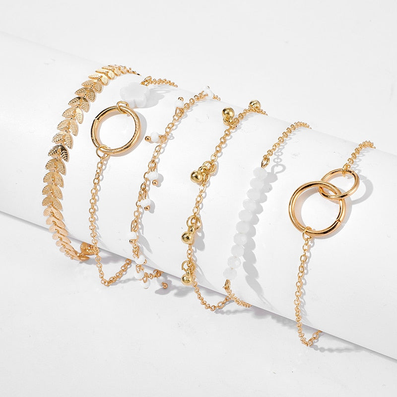 Bracelet à pompons doré, style bohème