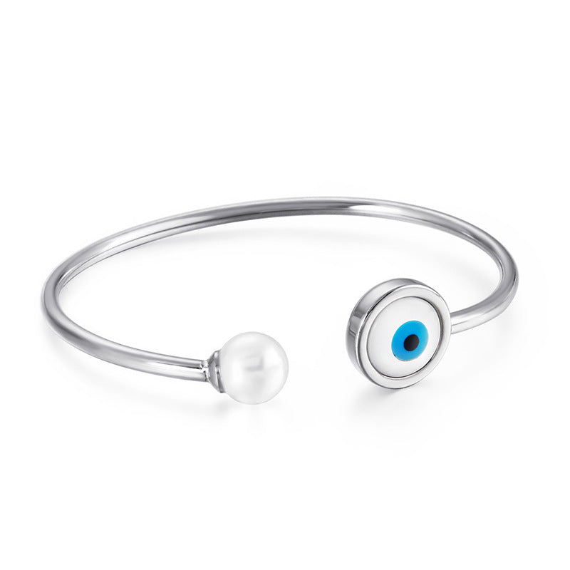 Bracelet ouvert perle et œil protecteur porte-bonheur