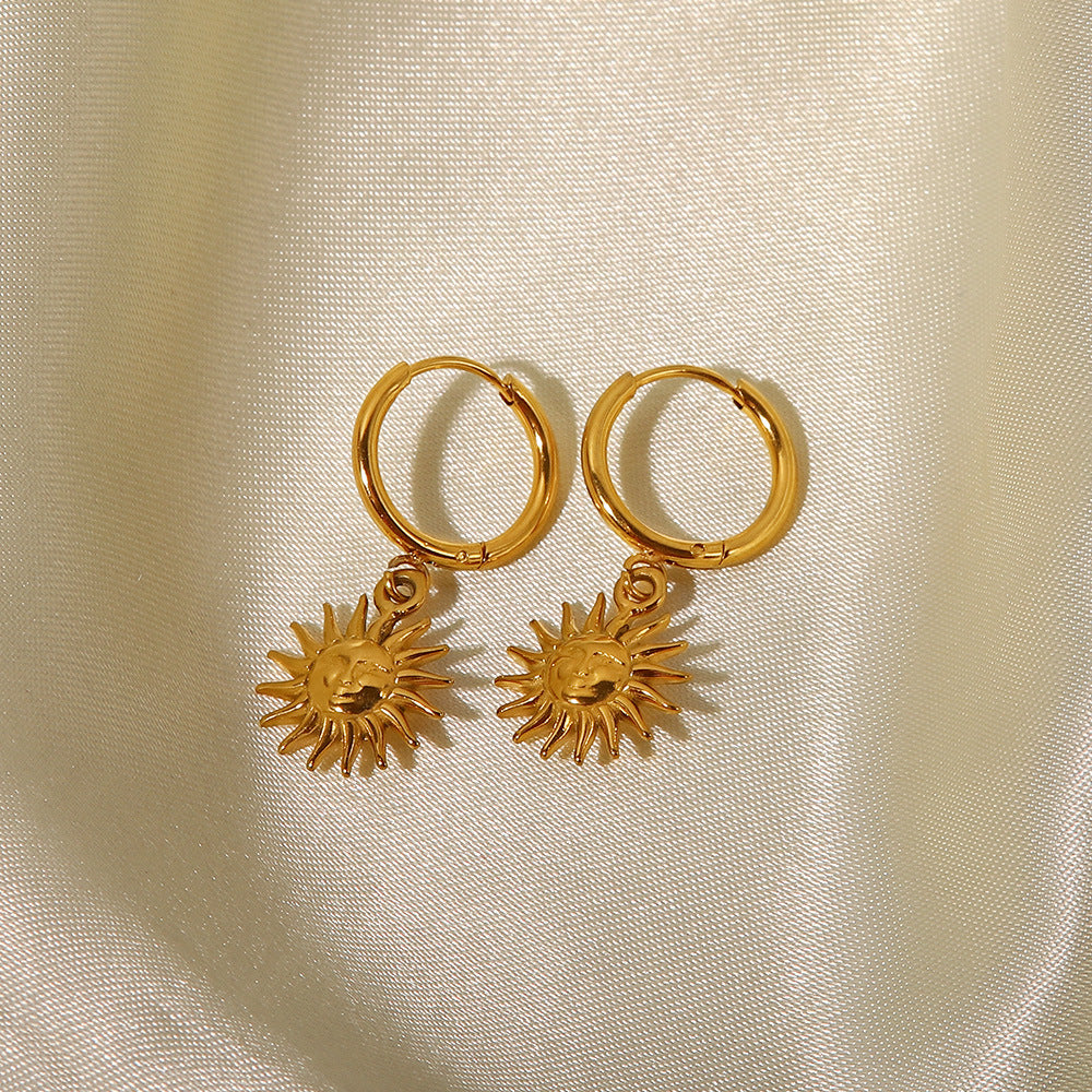 Boucles d'oreilles pendantes soleil, acier titane rétro