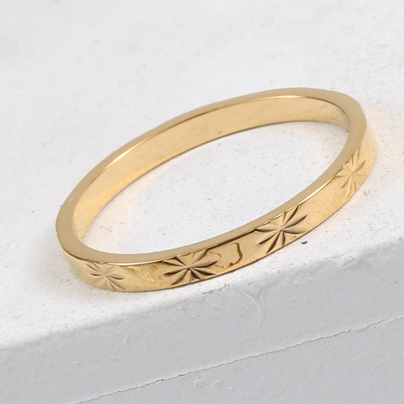Bague brillante, acier titane plaqué or 18 carats