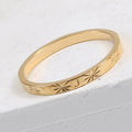 Bague brillante, acier titane plaqué or 18 carats