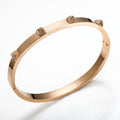 Bracelet rivets pointus, or rose