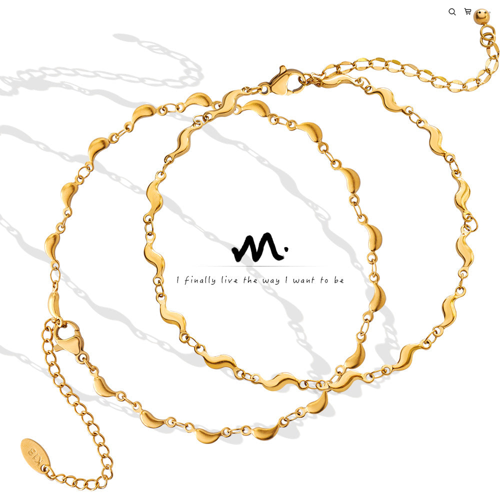 Bracelet de cheville dauphin, acier titane plaqué or