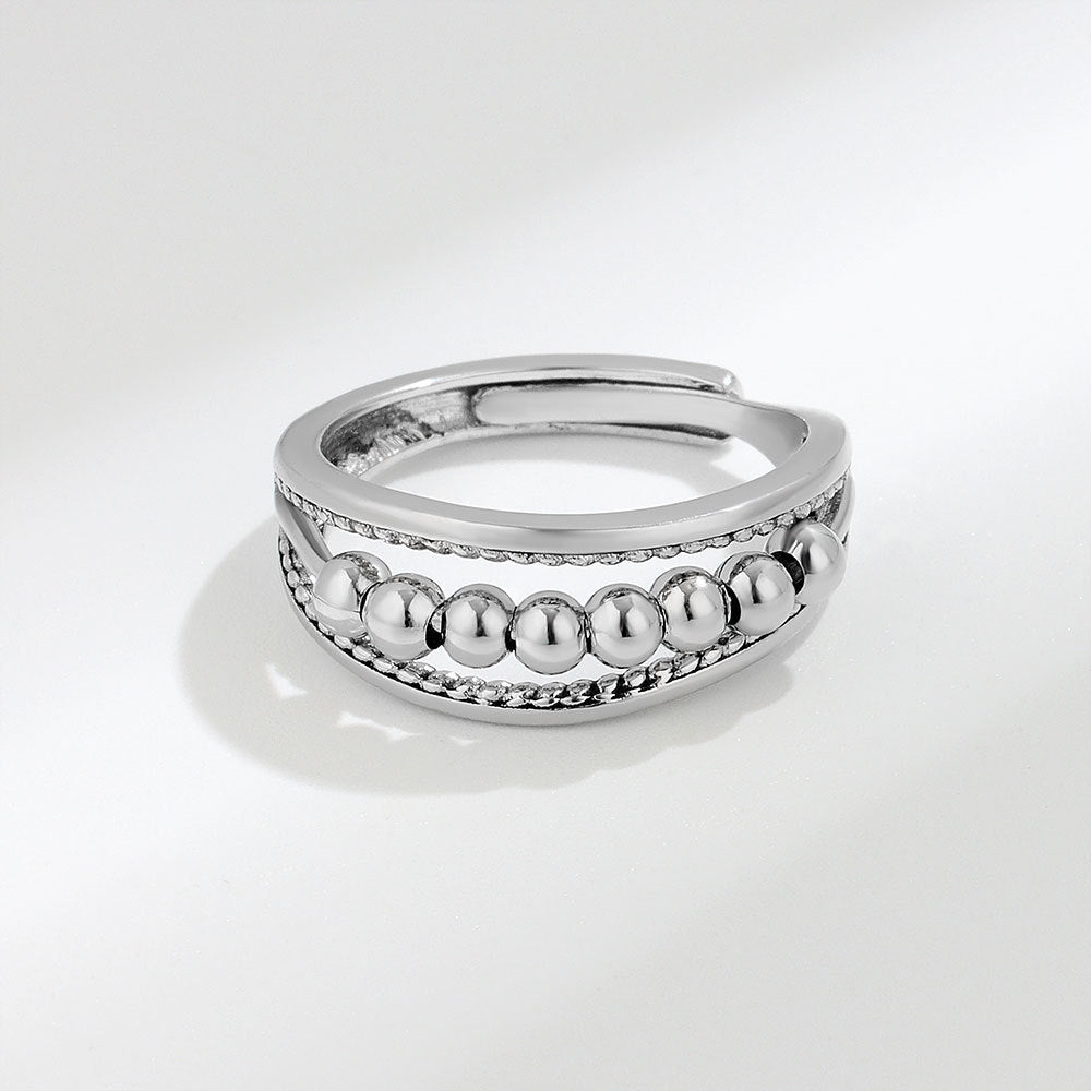 Bague rotative à perles à pois