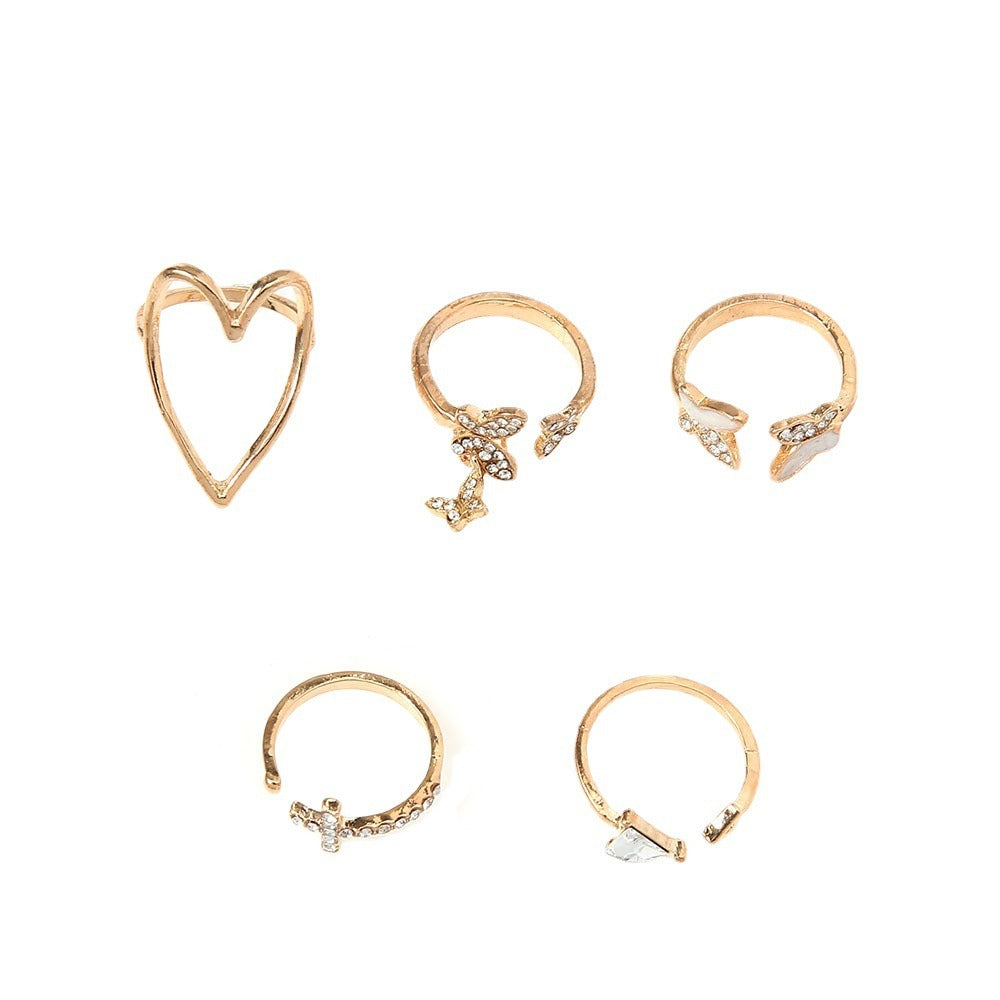 Set de 5 bagues croix, cœur et papillon zircon