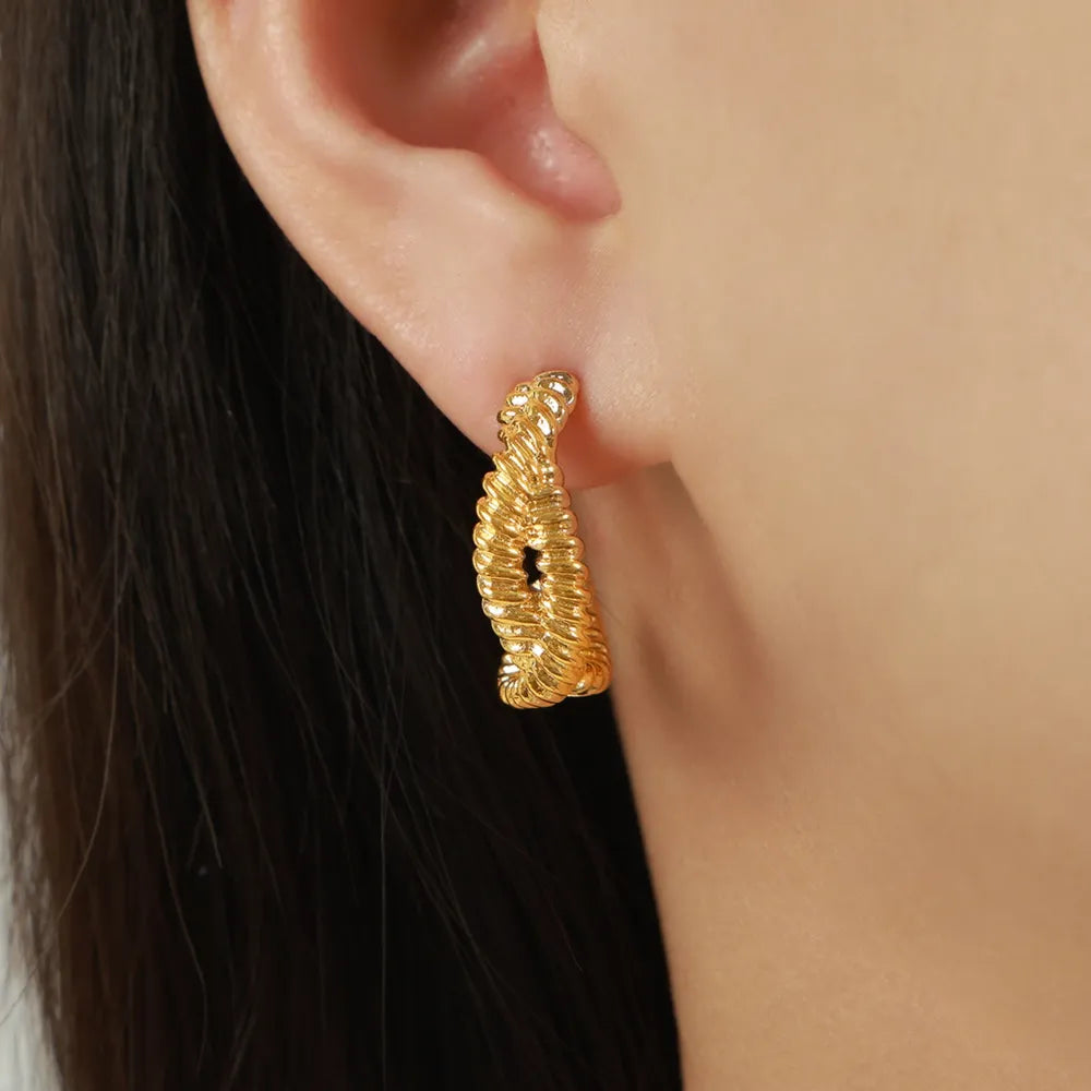 Puces d'oreilles géométriques, acier titane