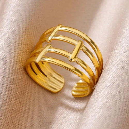 Bague large ajourée mixte, acier inoxydable doré