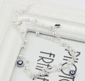 Bracelet de cheville pendentif perle et œil protecteur