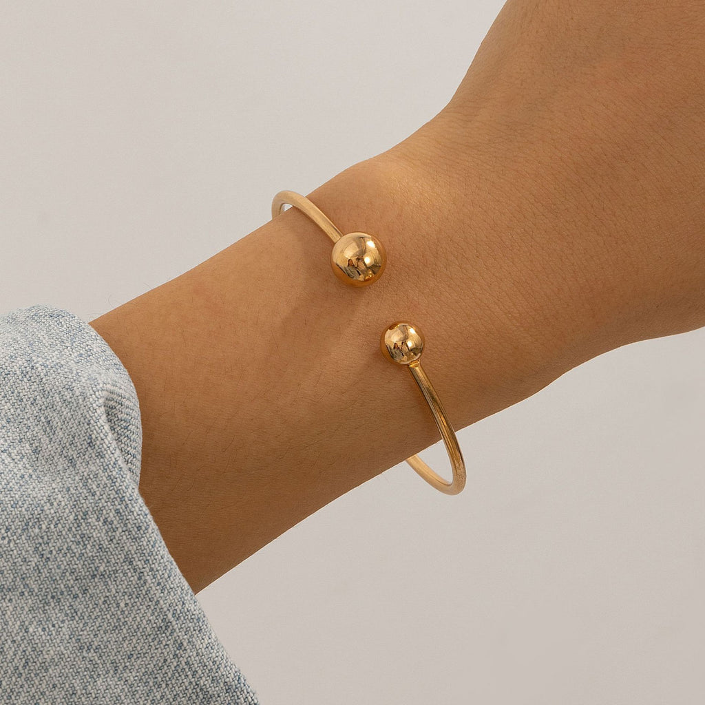 Bracelet ouvert double nœud ajouré, style commuter