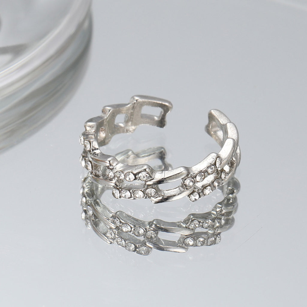 Bague ouverte perle et zircon, design épuré