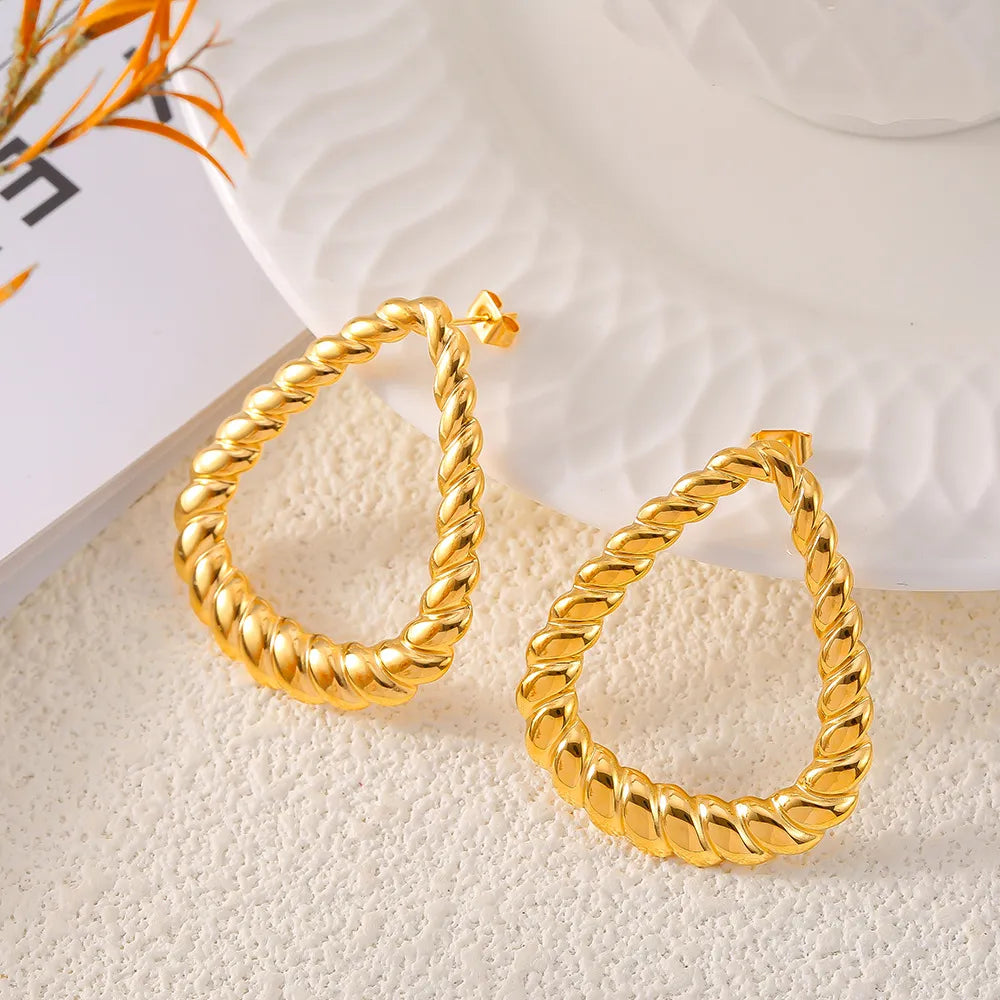 Boucles d'oreilles torsadées, plaqué or 18 carats