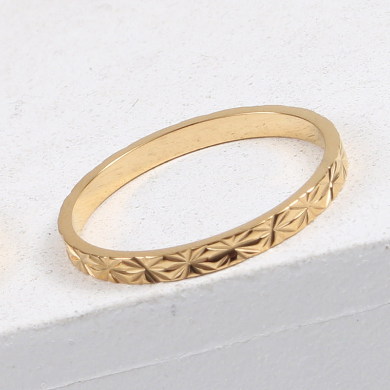 Bague brillante, acier titane plaqué or 18 carats
