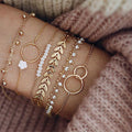 Bracelet à pompons doré, style bohème