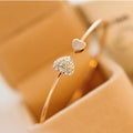 Bracelet manchette ouvert double cœur nœud, cristal
