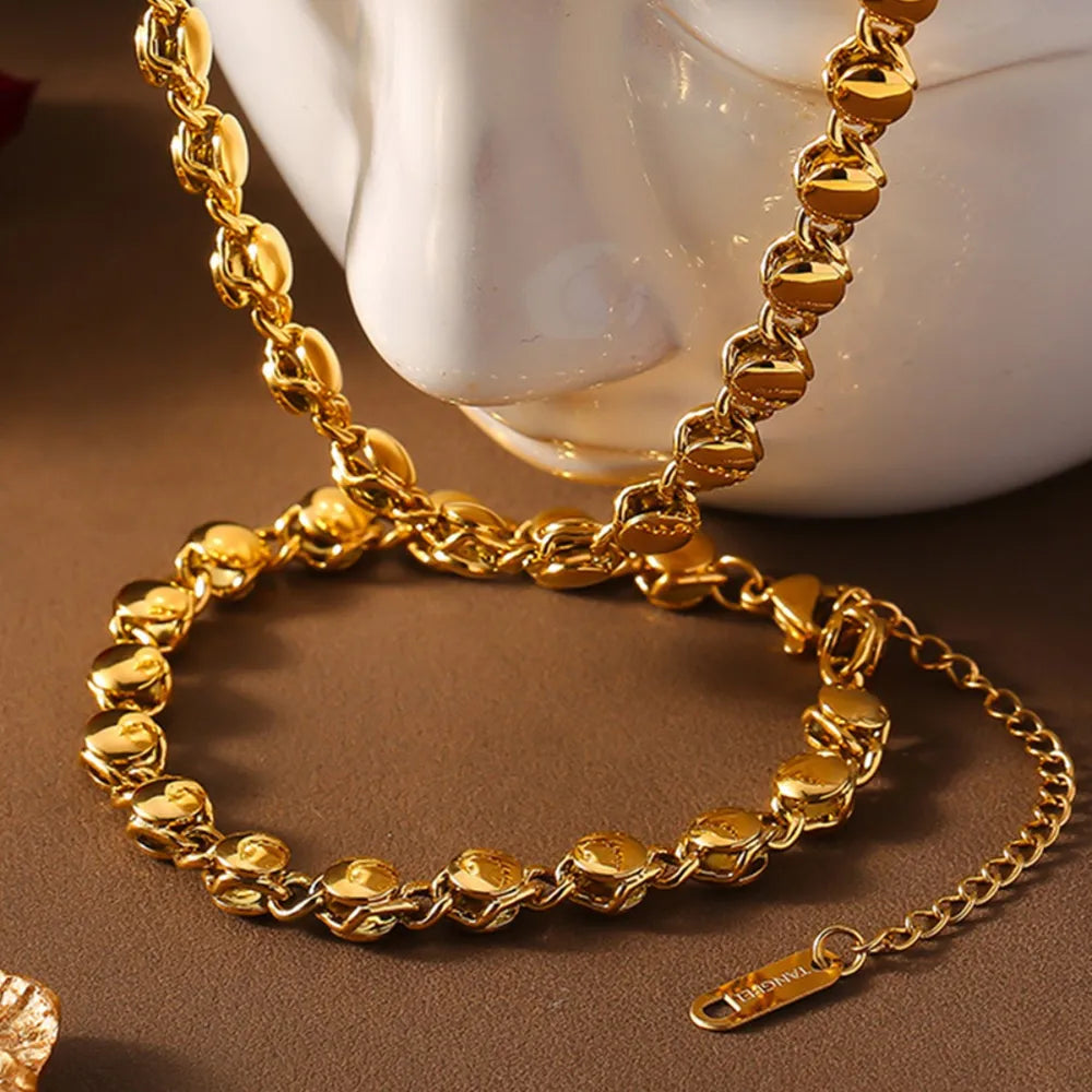 Bracelet, plaqué or 18 carats, acier titane