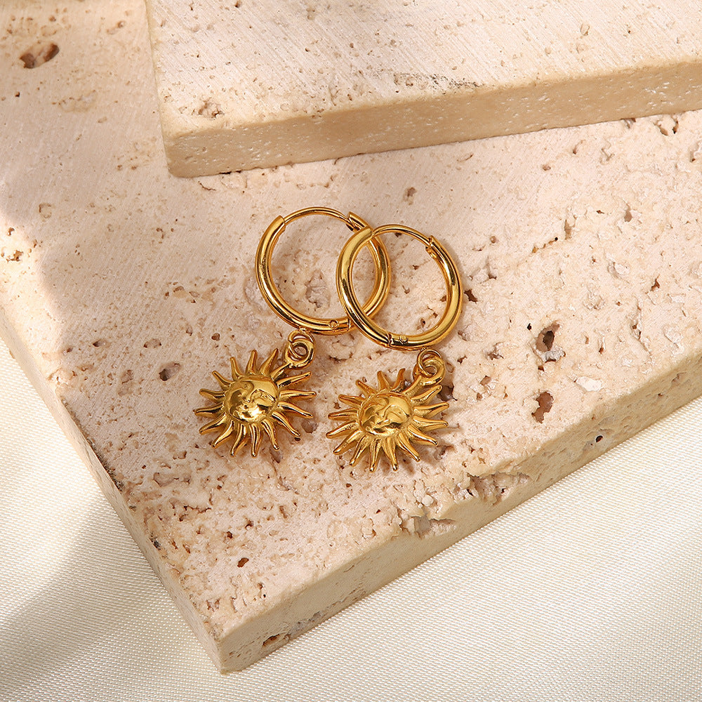 Boucles d'oreilles pendantes soleil, acier titane rétro