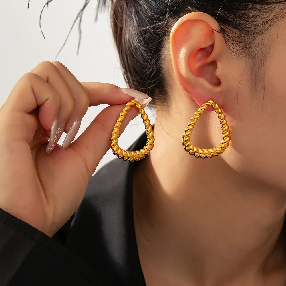 Boucles d'oreilles torsadées, plaqué or 18 carats