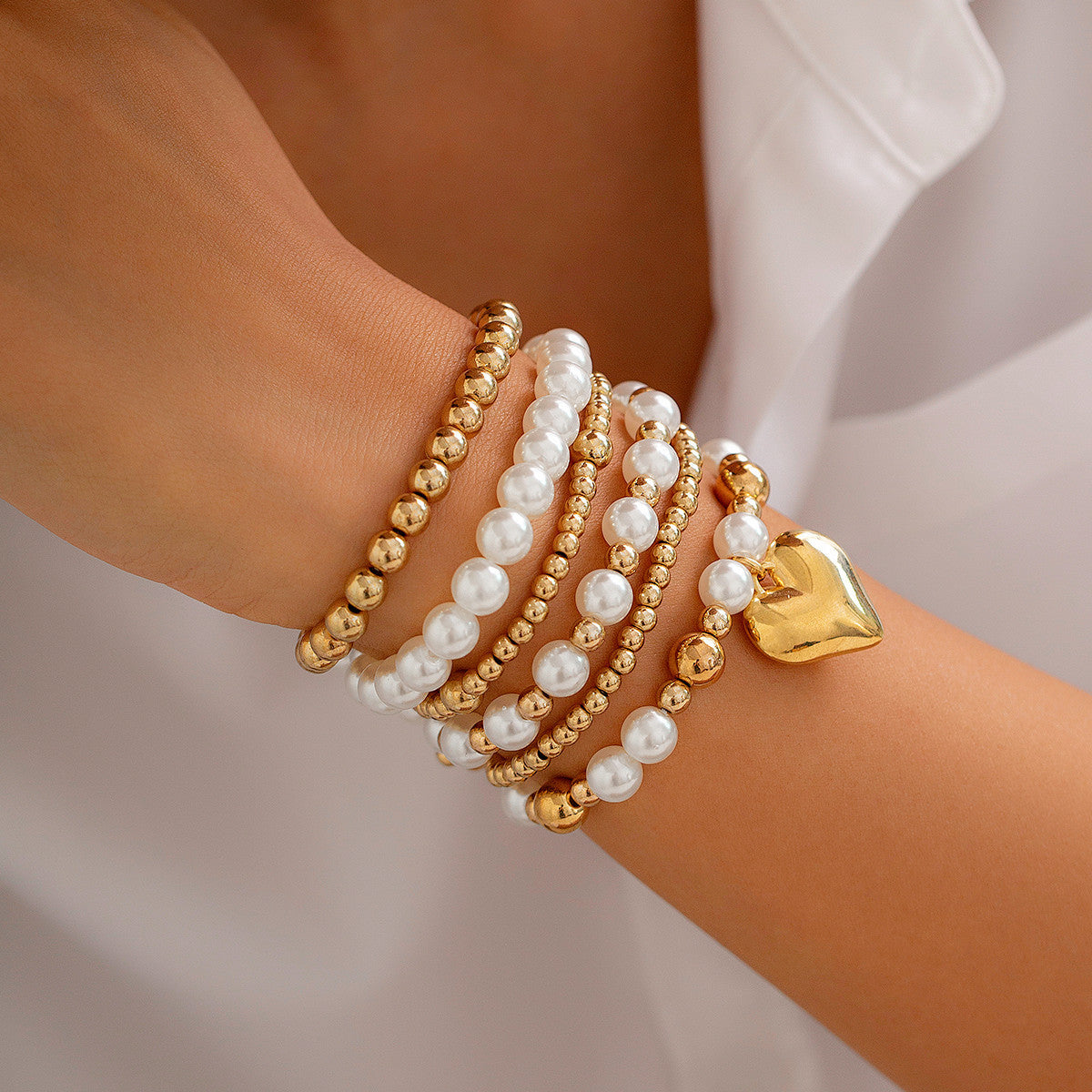 Set de bracelets perlés minimalistes, motif cœur ajouré
