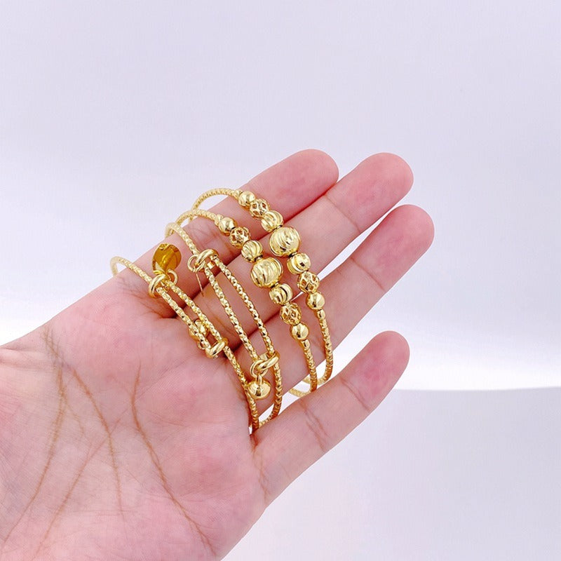 Bracelet clochette perlé ajustable, plaqué or